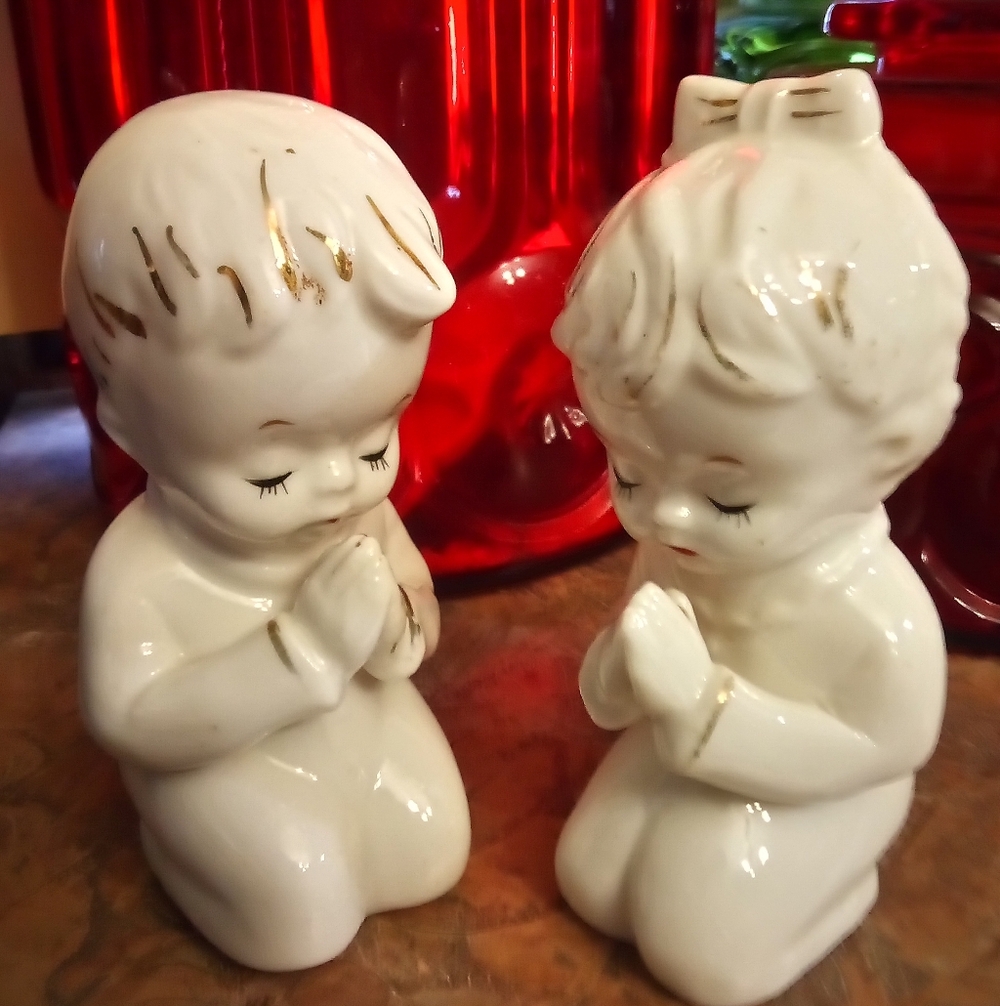 Vintage Porcelain Praying Boy And Girl Salt And Pepper Shakers With Gold Trim.